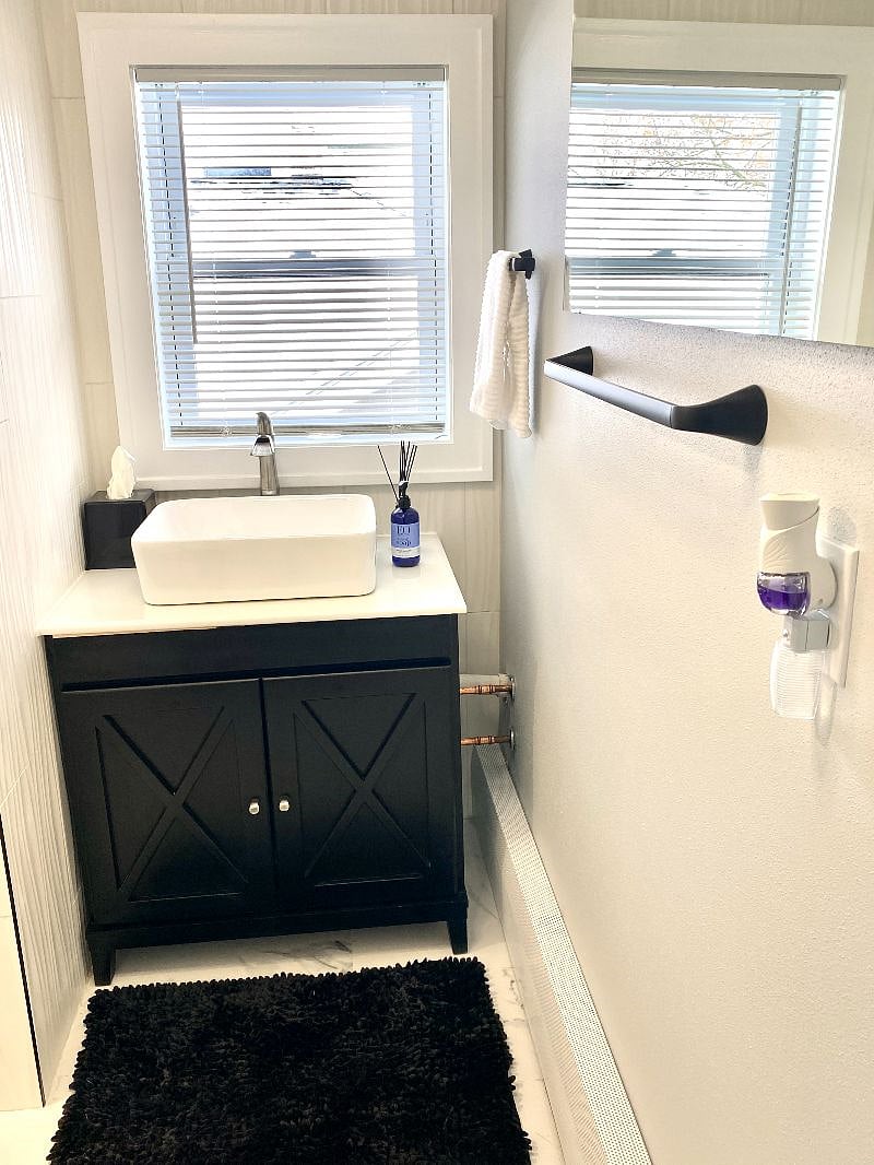 Bright, modern bathroom with sleek features and plenty of natural light.