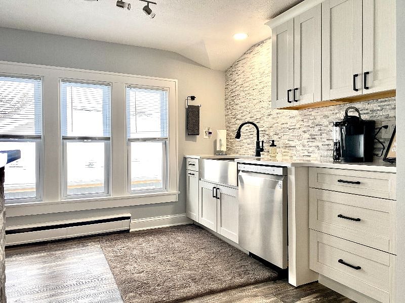 Modern kitchen with stainless steel appliances and a convenient coffee station