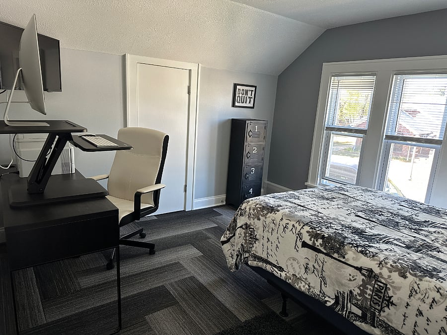 Bedroom #2 with cozy memory foam full size mattress. Store items in closets.