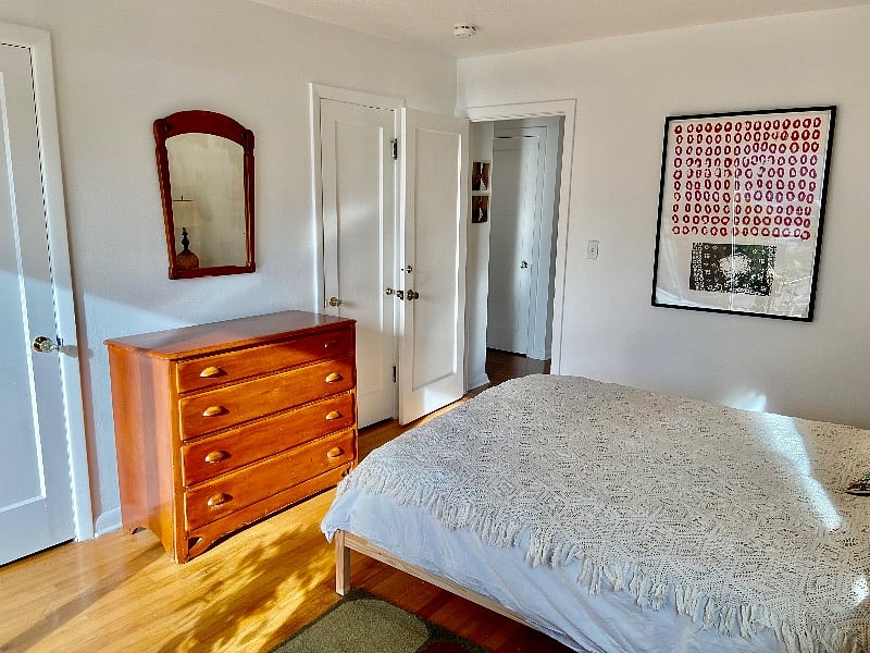 two full closets and a classic wooden dresser