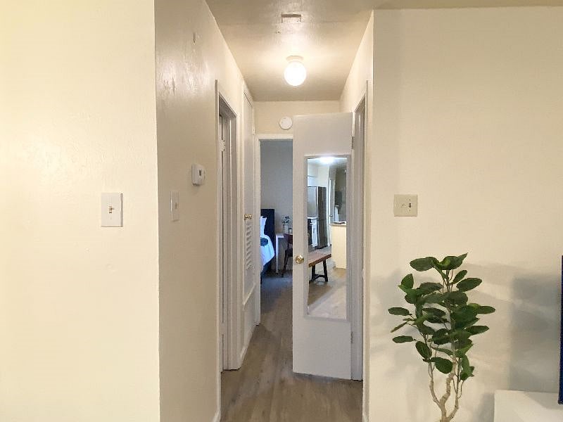 Hallway to the two regular bedrooms
