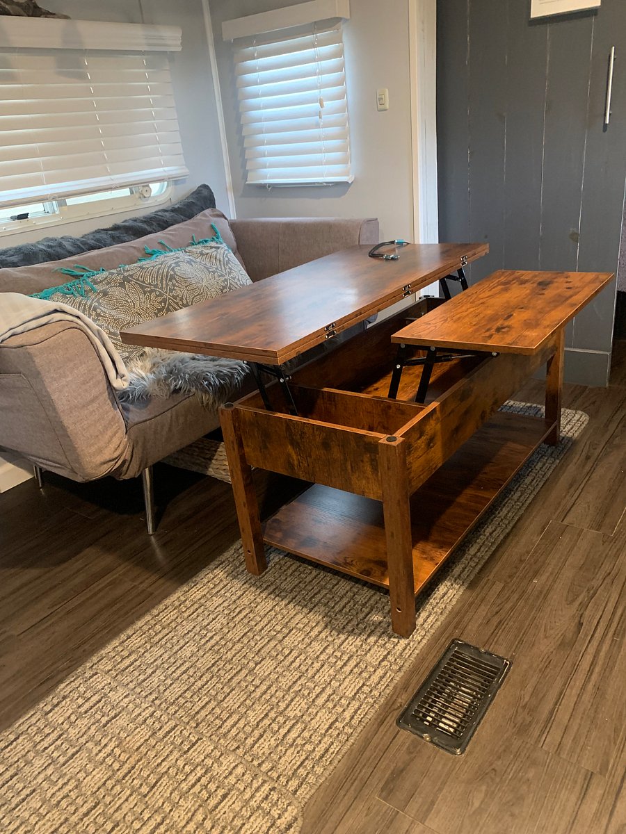 Coffee table converts to desk/storage work space
