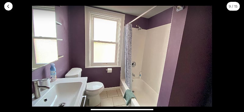 Full bath with tub/shower combo.
