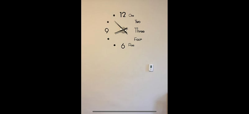 Clock on dining room wall.