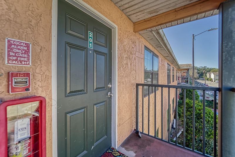 Second Floor Outside Entry with Welcome Mat