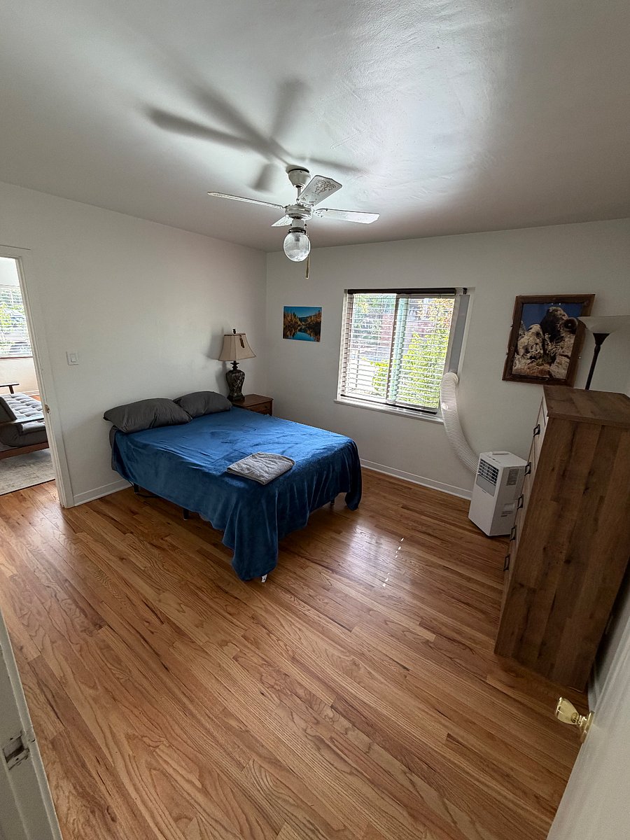 Bedroom with full size mattress view #1