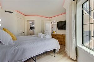 Bedroom 1 with King size bed, mood lighting and 65inch tv