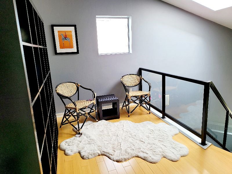 The bright third floor sky loft is a great place to read or relax