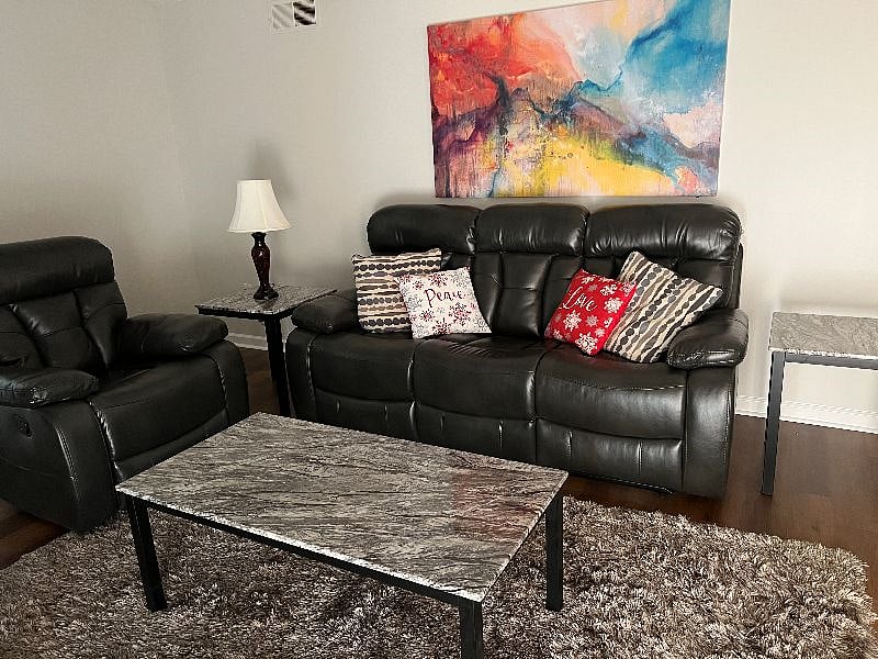 Comfortable living area with fire place.