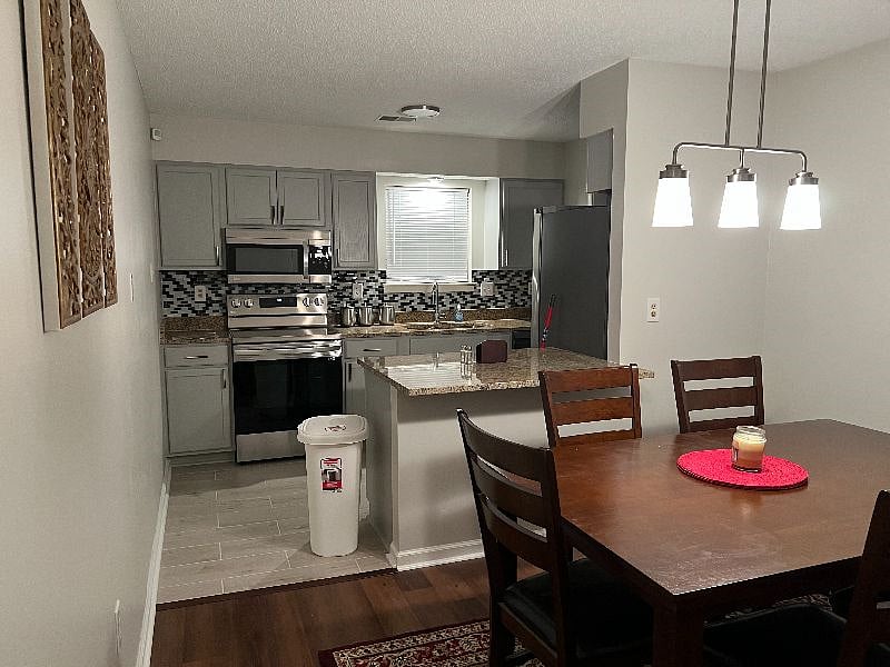 Dining area include bar seating.