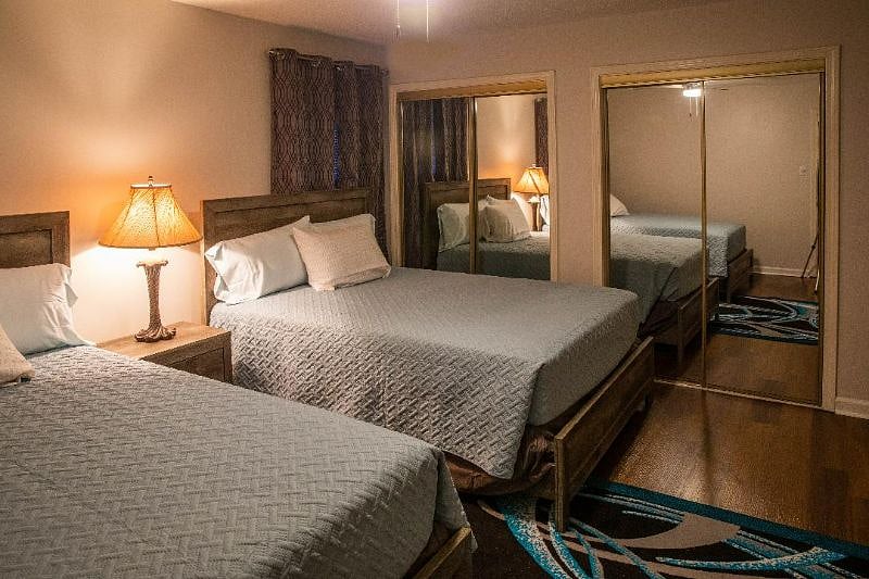 Full beds in this roomy bedroom with 2 separate closets. This master bedroom has a private bathroom.
