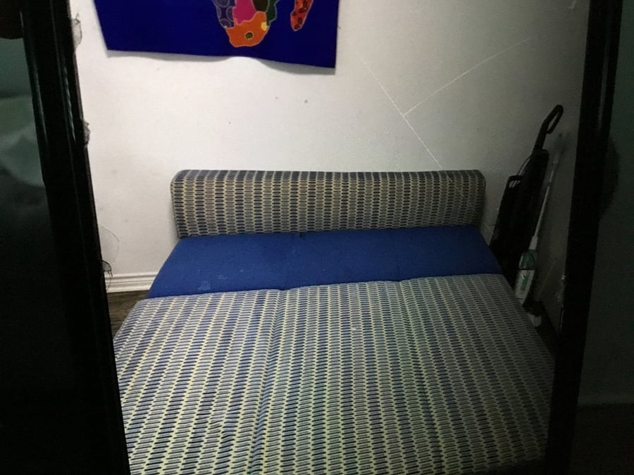 Sofa with extended ottoman for over night guests downstairs 