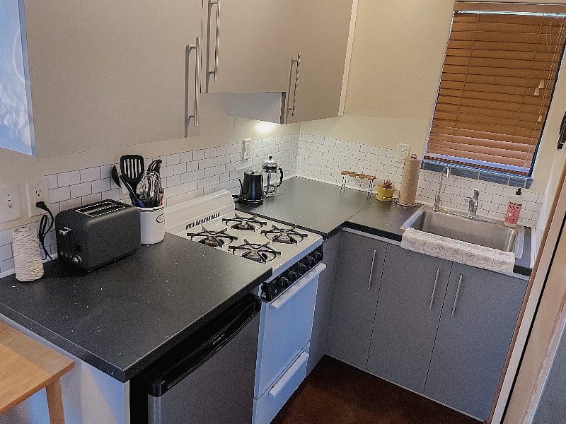 Small gas stove and oven. Toaster. Coffee maker. Kettle. Microwave