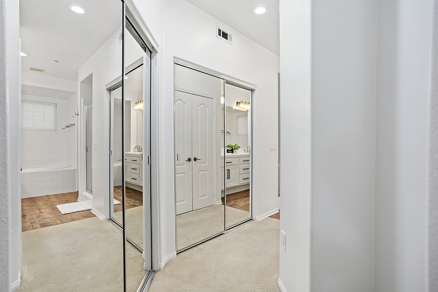 Master hallway mirrored closets
