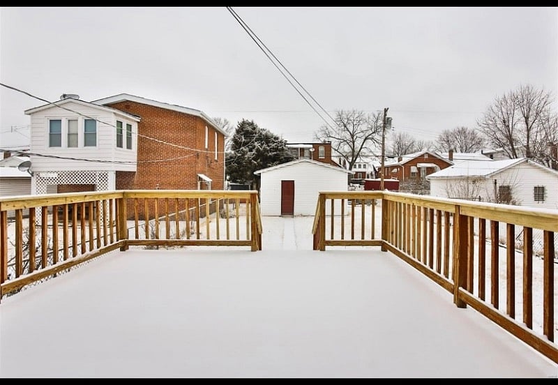Spacious back deck outside of the kitchen back door.