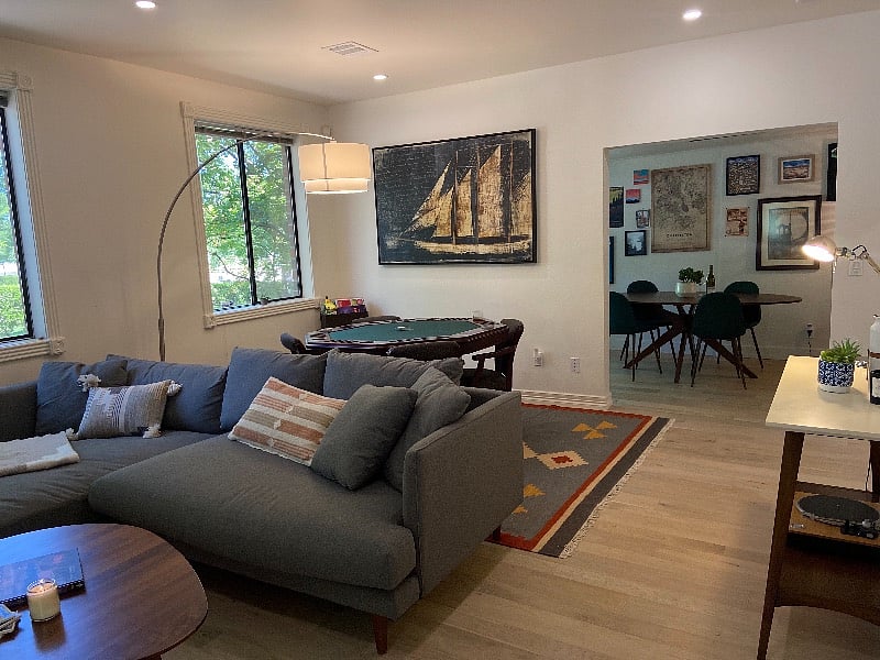Large living space with convertible poker table (or flip for regular game table).