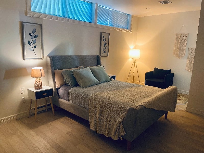 Master bedroom with attached half bath.