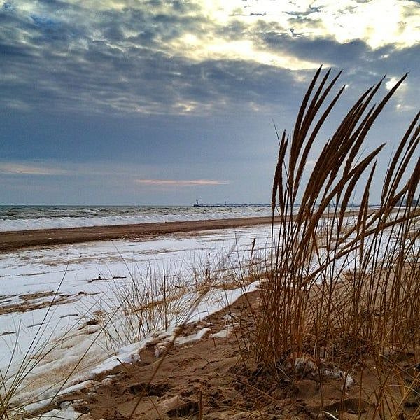 Neshota Beach voted best in Wisconsin. Lighthouse in the distance. 