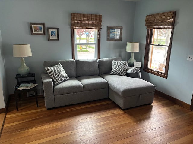 New living room sofa chaise. Cushions pop out in the bottom to make a queen sized bed or very comfy TV viewing. 