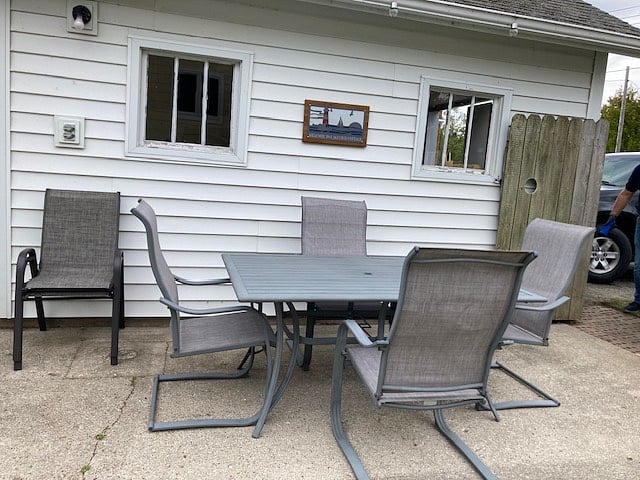 Outdoor furniture with two extra chairs. 