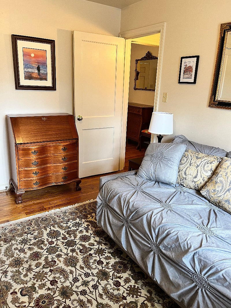 Bedroom 1 includes a daybed with trundle and has two twin beds and a closet with hangers.  However, this room can also be used as a dedicated office or sitting room as it has a desk and an LG 45 inch 4k LED WebOS Smart TV.