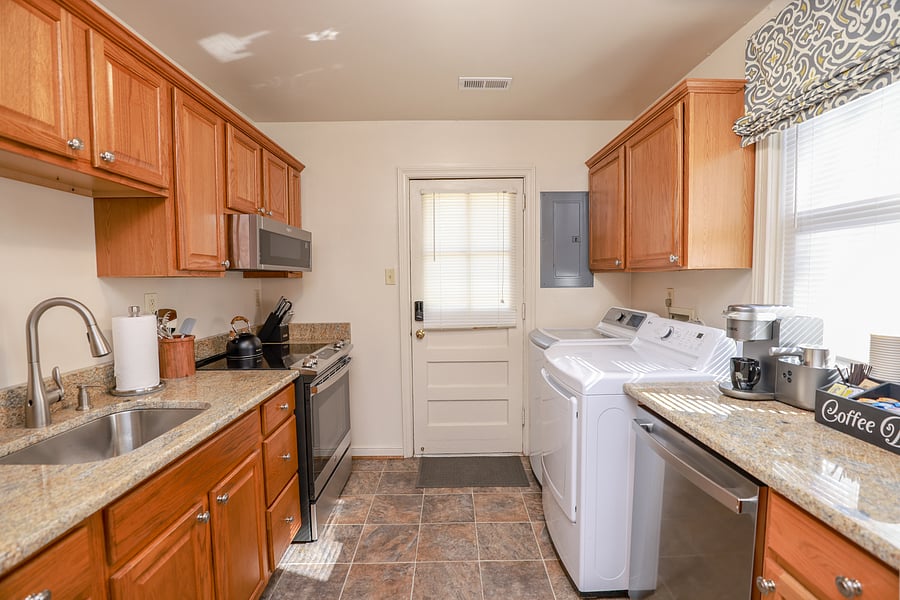 The kitchen has been recently renovated with additional cabinets for storage, new stainless appliances, stainless touchless kitchen faucet, Keurig coffee, latte and cappuccino maker, toaster and blender.