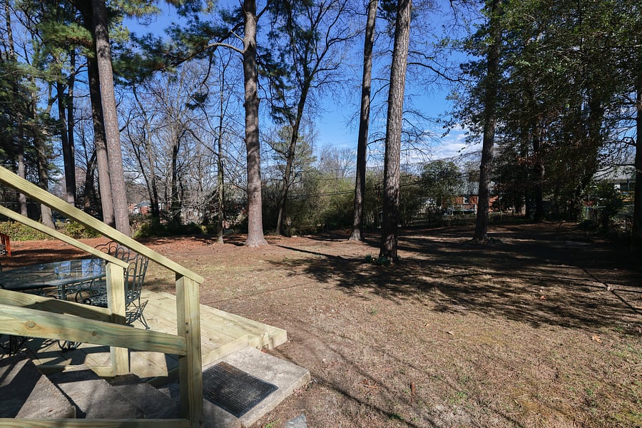 The home has a private, park-like lot with mature trees.