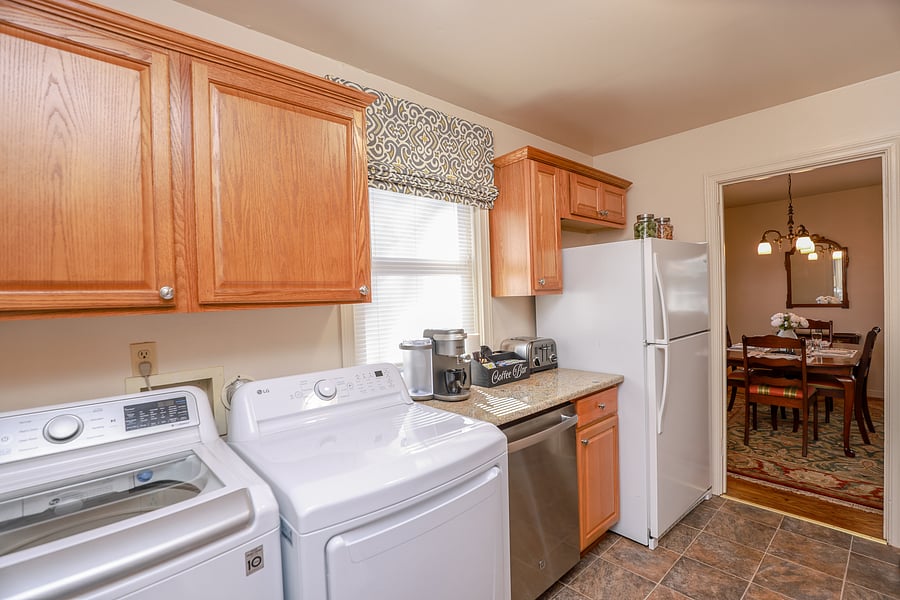 The kitchen has been recently renovated with additional cabinets for storage, a stainless dishwasher, Keurig coffee, latte and cappuccino maker, toaster and blender.