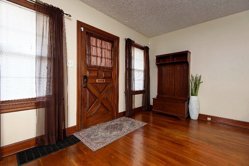 Enter the front door into the main dining area. Keep things tidy with coat and shoe storage.
