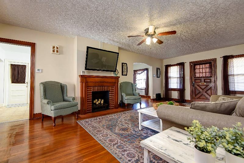 The spacious living room boasts plenty of seating.