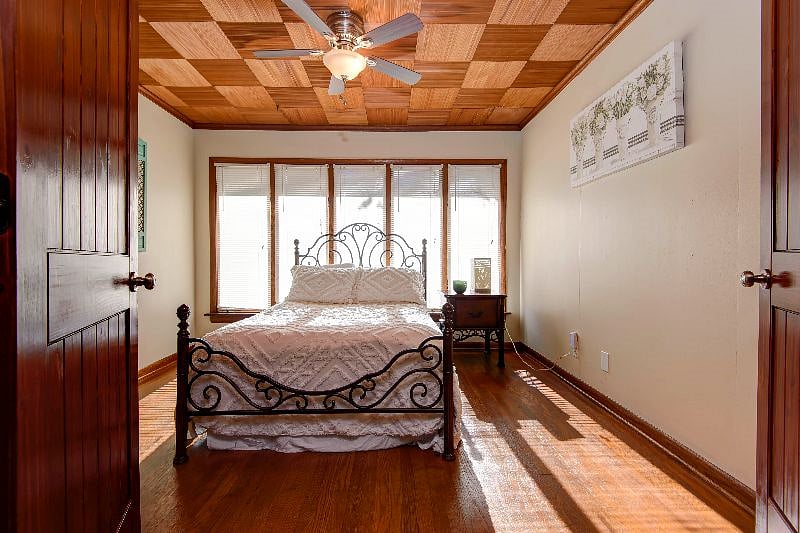 Bedroom 2 has double doors for privacy.