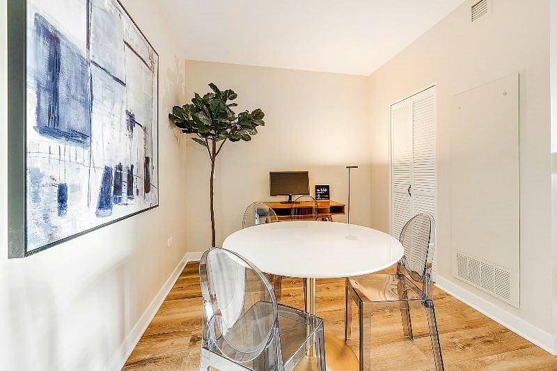 Dining For Four and Designated WorkSpace with Monitor.