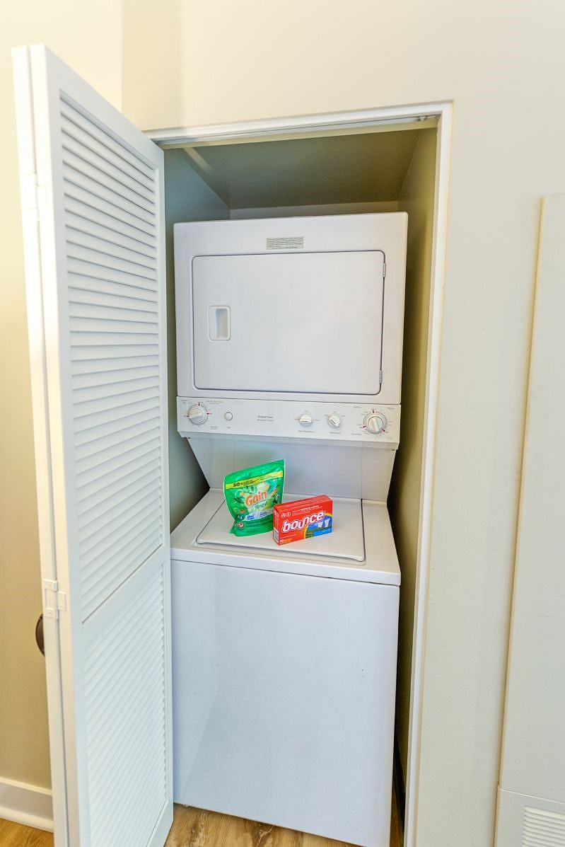Full Size Stacked W&D and Laundry Soap.