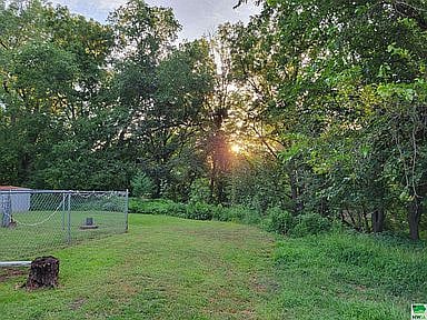 Nice, peaceful back yard. Deer are regularly seen along with other animals down in the creek which is a quarter of a mile in the back yard.