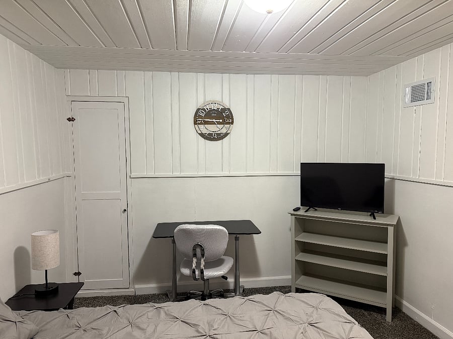 Small workstation that can lift in order for you to work sitting down or standing up! Also, a small Smart TV with Roku! We do not offer cable TV at this location.