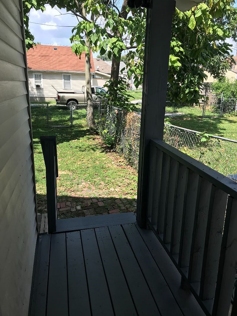 back covered porch outside kitchen door