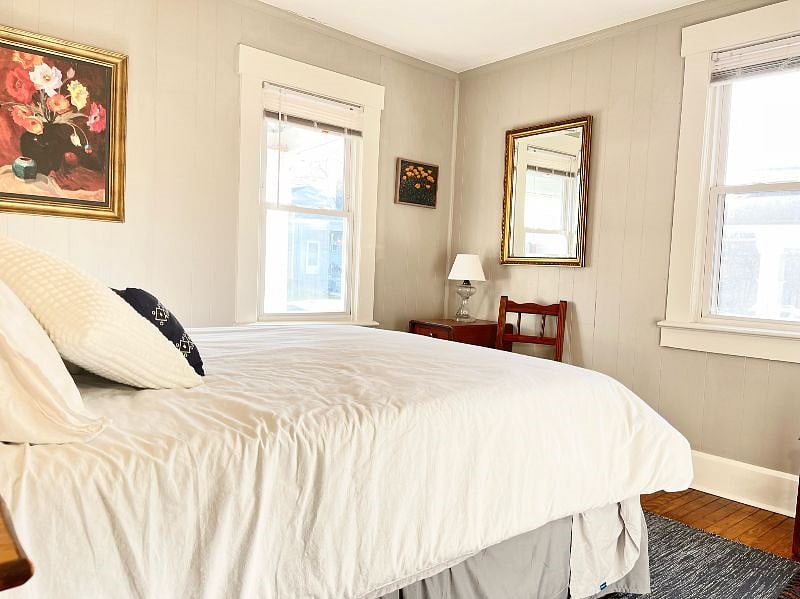 front bedroom with queen bed (now with blackout curtains!)