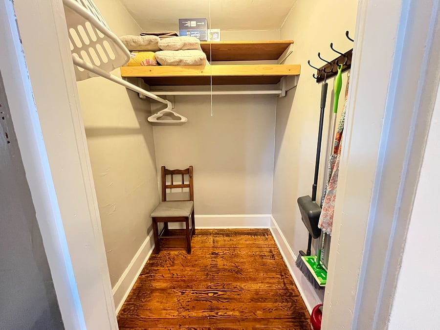 large walk-in closet in back bedroom