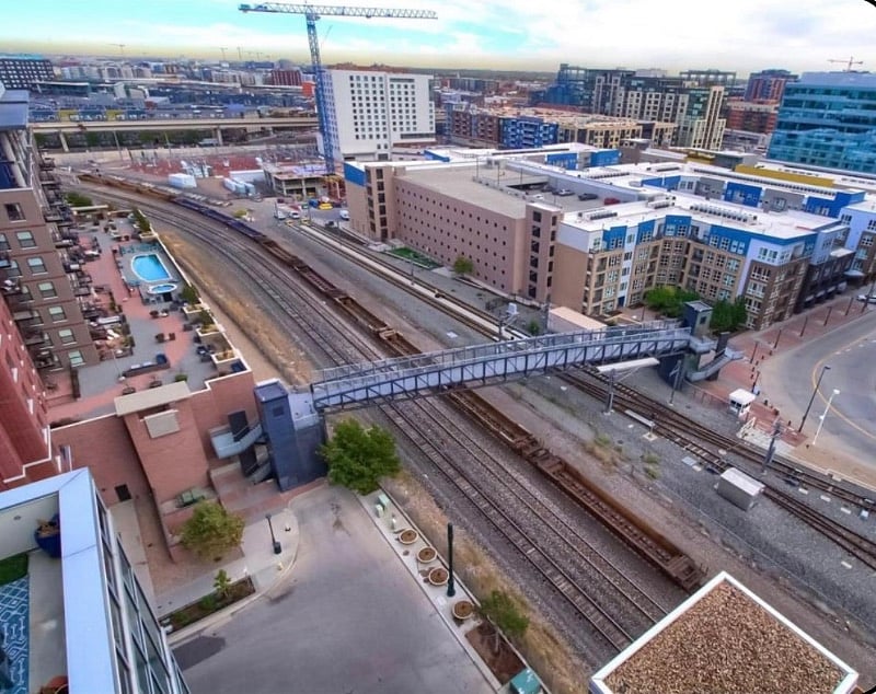 18th St bridge to Whole Foods, CVS, and King Soopers. Steps away.