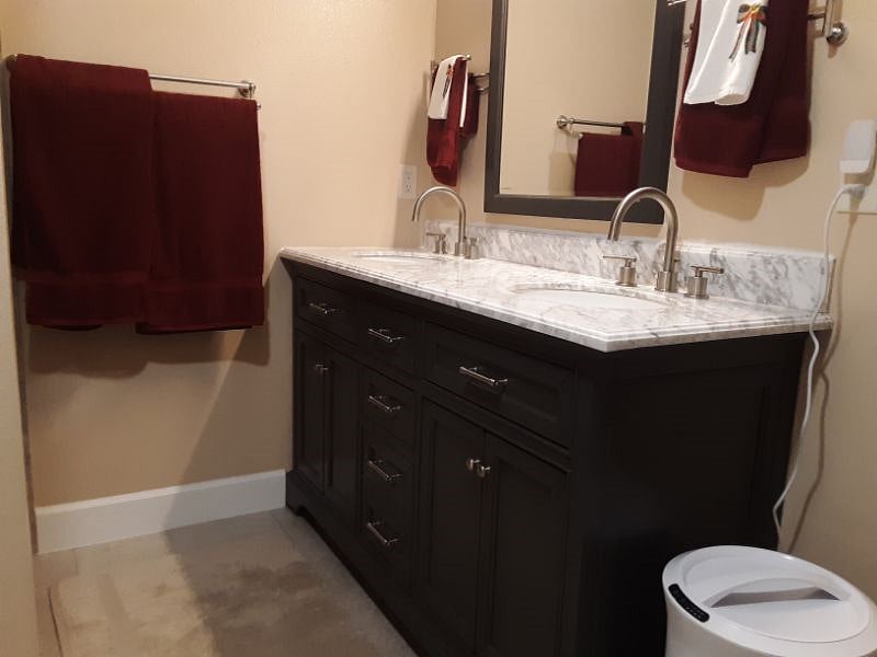 Your double vanity and radiant heated floor.  No cold feet here!  It's your private bath.
