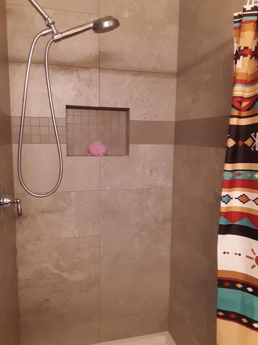 Guest bath shower. All dependable, fashionable, Moen plumbing fixtures.