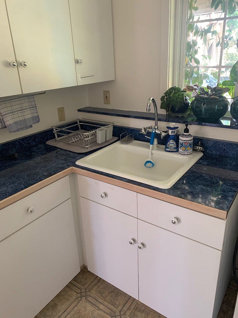 Sink for you to use in the laundry area (only for your use). Additional counter space for kitchen gadgets can be used also and small cabinet for dishes available also!