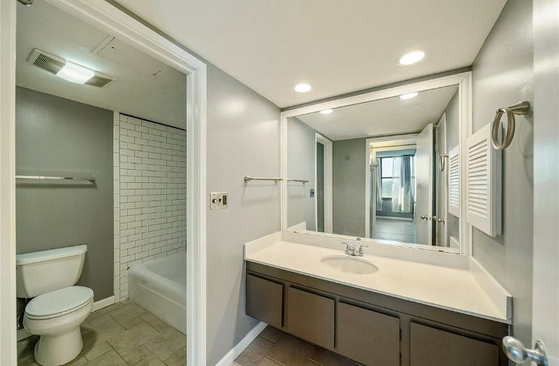 This is your bathroom... new tile and golden fixtures to match... oh hell idk about matching but they look cool.