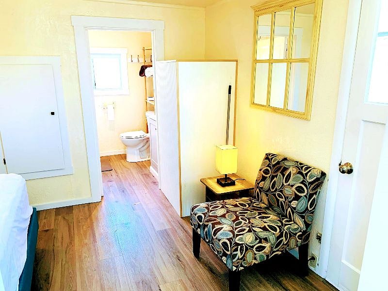 Bedroom, walk in closet, seating area with it's own door to the private yard