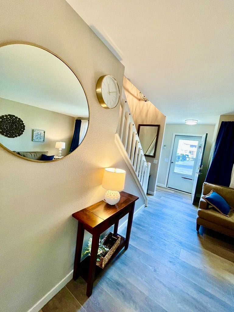 Front Entry and stairway leading to master bedroom, second bedroom and bathroom