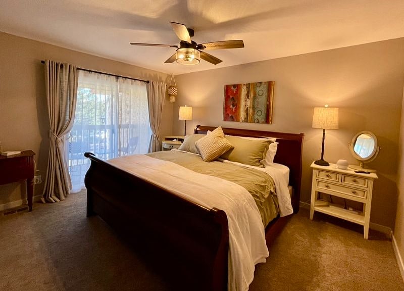 Master Bedroom - looking towards the sliding door leading to the private balcony