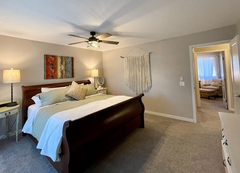 Master Bedroom - Looking towards the stairway landing, second bedroom, and full bath.
