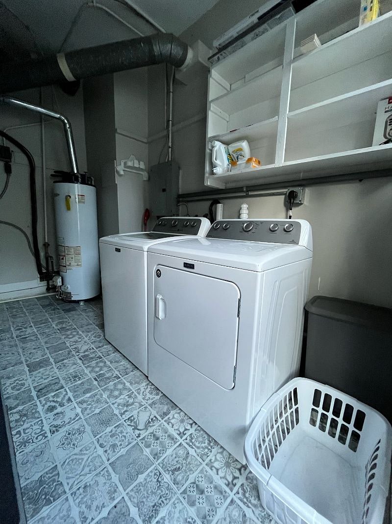 Washer Dryer in pantry next to kitchen.
