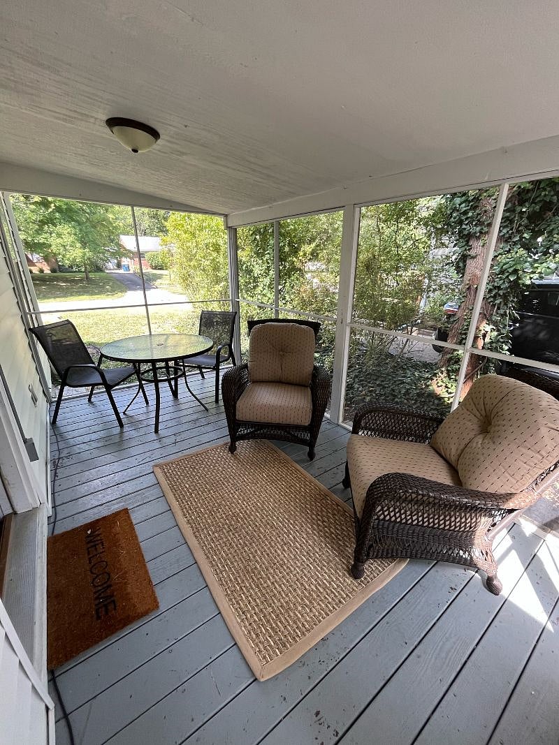 Enjoy summer nights in the screened in porch.