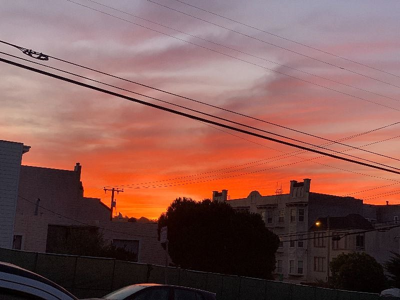 Morning sunrise from in front of the house. Living room gets sun in the morning and light all day long.  